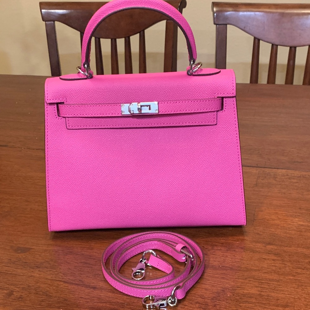 Brand new Absolutely stunning fuchsia real leather trendy purse size 25 w/ strap